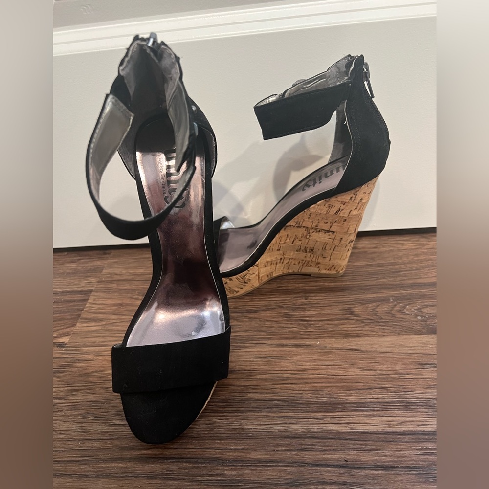 Size 7.5 never worn black and cork wedge heeled sandals.